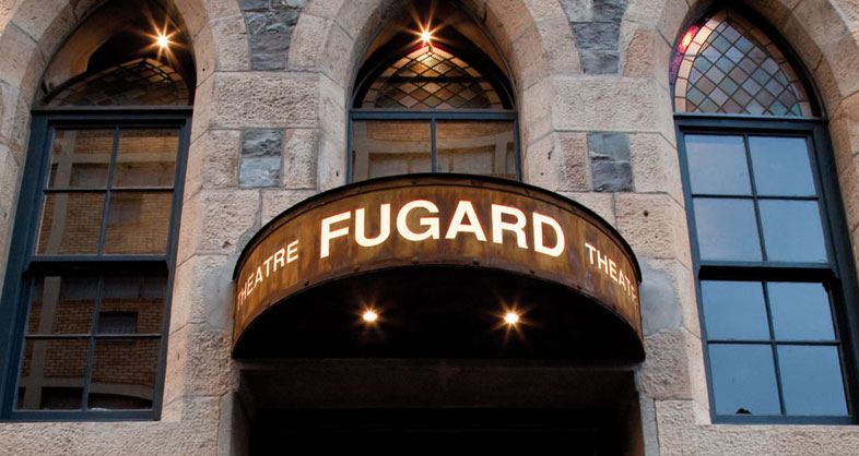 Outside of the iconic Fugard theatre with brick walls
